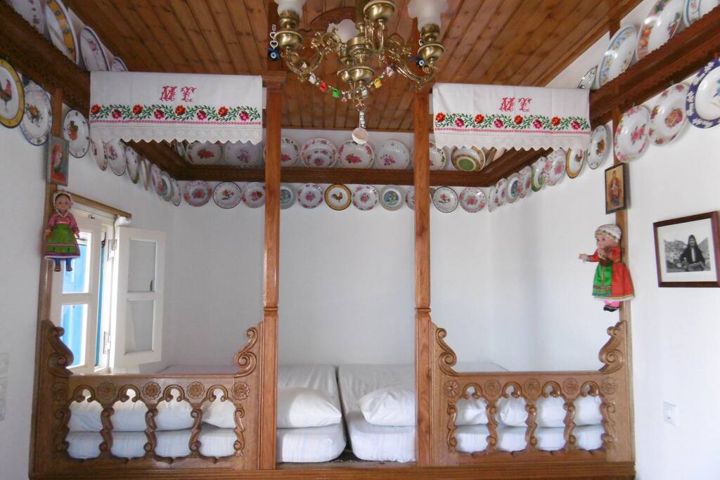 Cottage “Elaeon”, the inside of the main house with the traditional
"sofa" (king size bed), view 1.