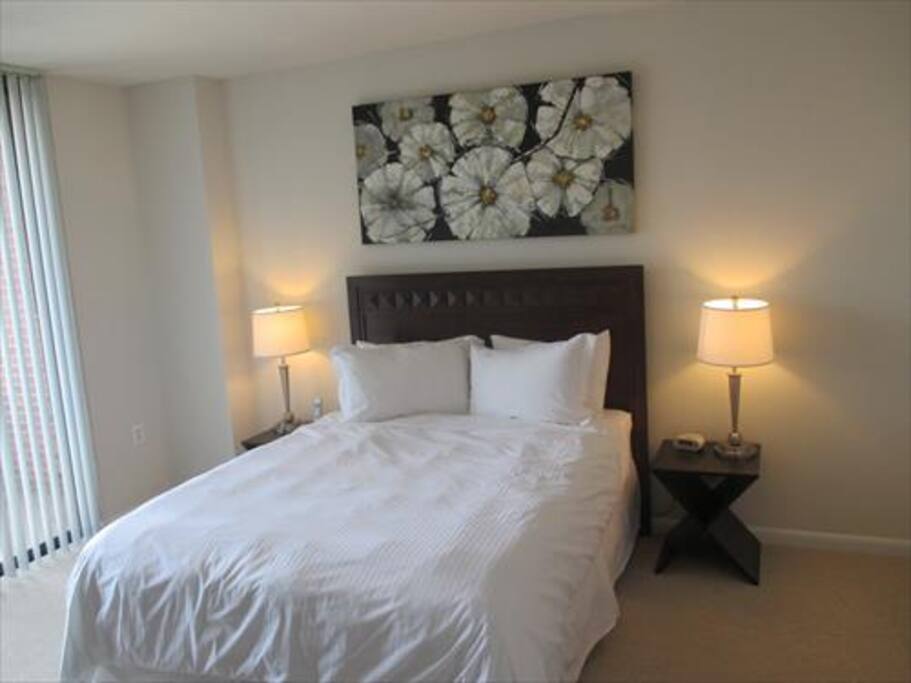 Private master bedroom offers a queen bed, large closet, and window offering great views.