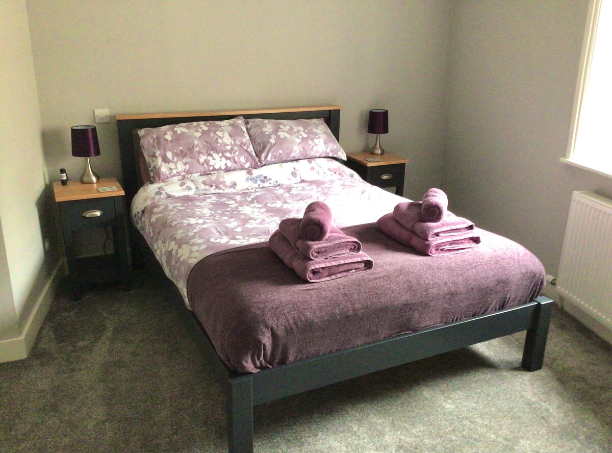 Each bedroom has been finished in the same style but each has it’s own individual colour scheme. Both bedrooms have a king-sized double bed, matching bed-side cabinets, dressing table, chair and an open wardrobe.