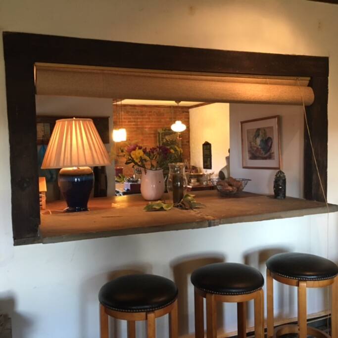 Bluestone bar linking tavern living room and kitchen