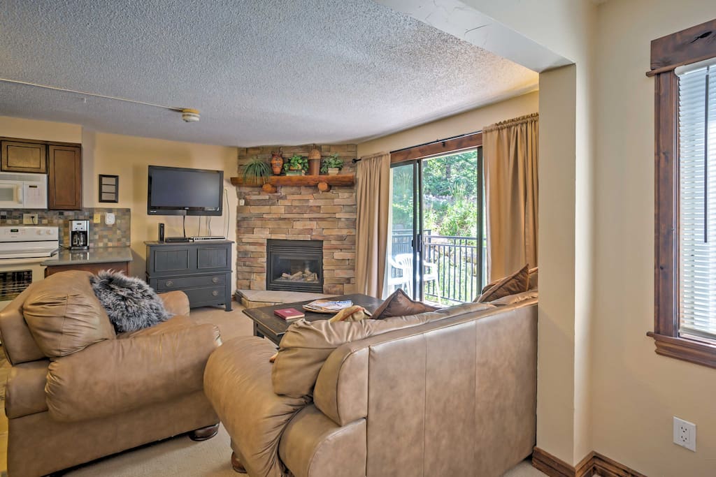 The living room offers a comfortable spot to relax during your downtime.