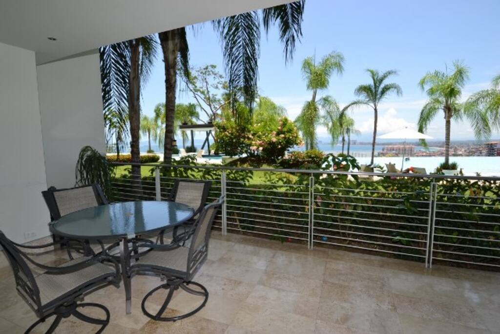 Terrace with pool and bay view