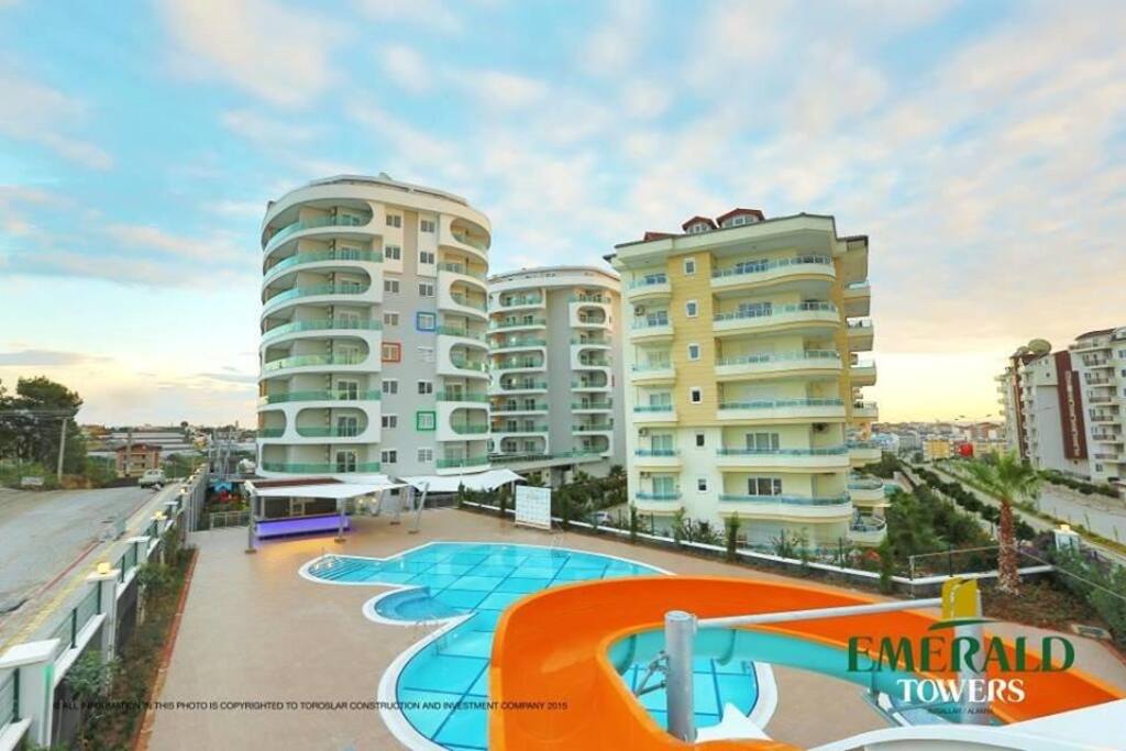 Big outside swimming pool with slides