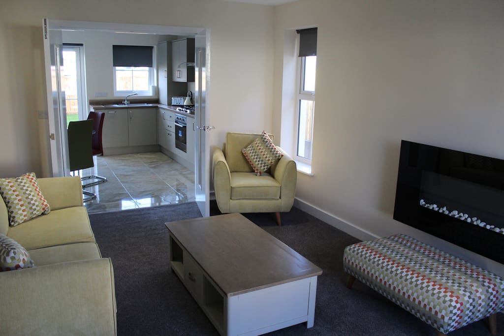 Lounge opens to dining/kitchen
