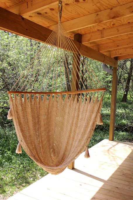 Hammock swing on back deck for relaxing and enjoying the sounds of nature