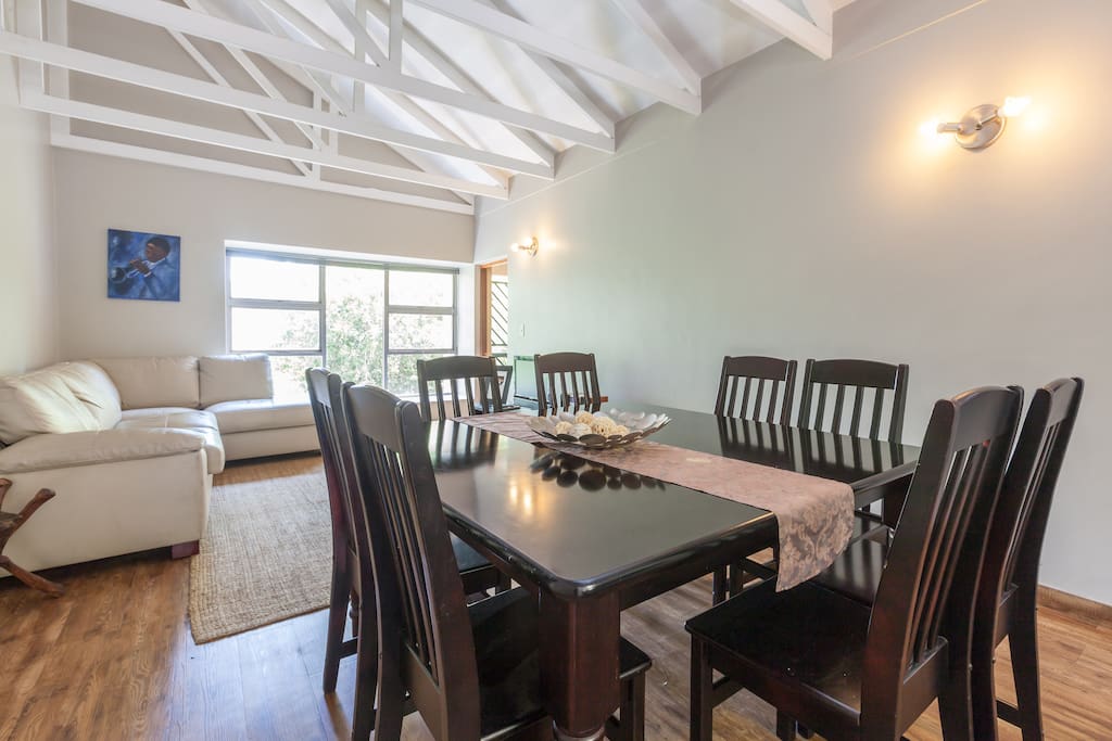 Large open plan living area perfect for entertaining and relaxing. Huge bay windows look out onto tree follage and sunshine!