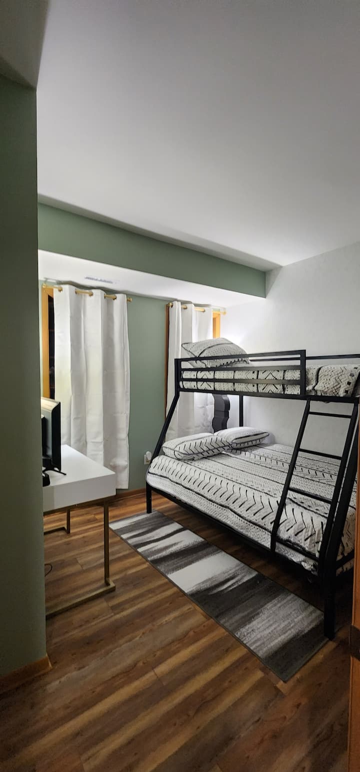 Twin over full bunk bed & smart tv in bedroom 2