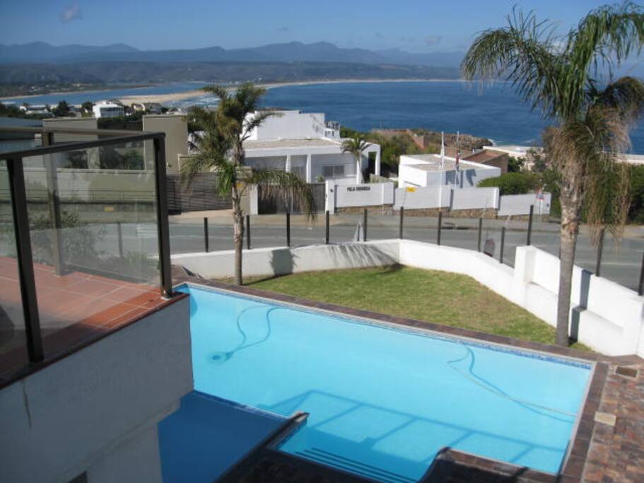 Take a refreshing dip in the pool while enjoying the seaviews