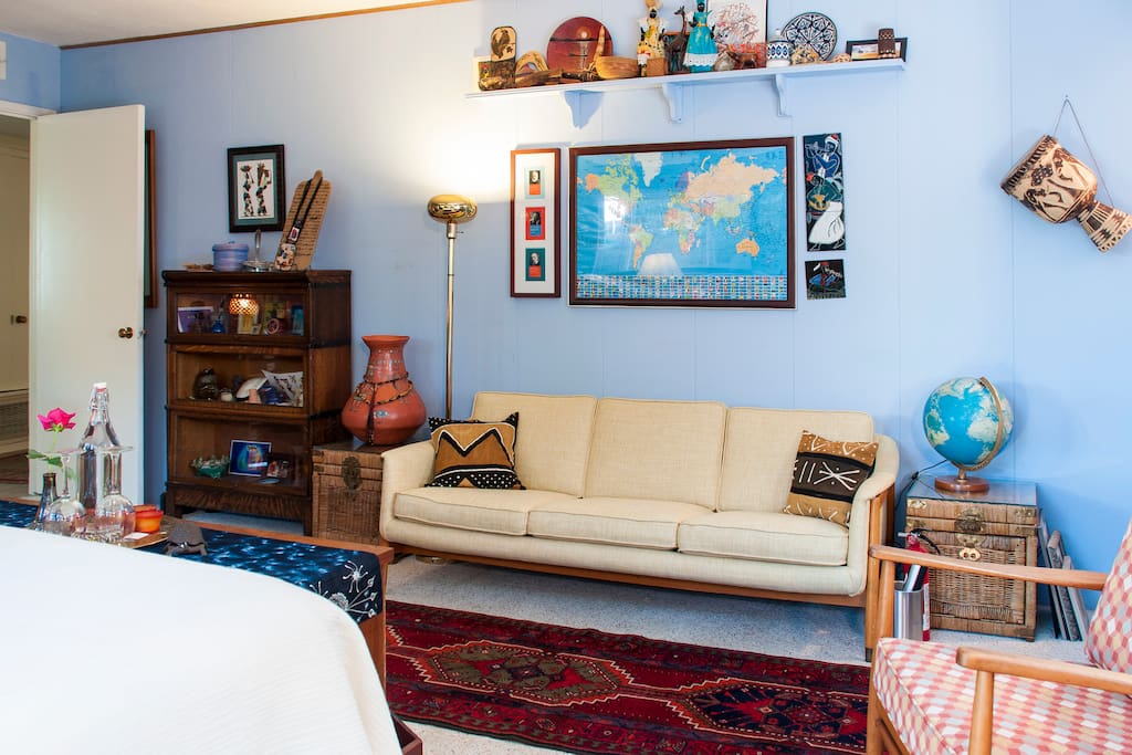 Yes, still your room. Mid-century couch, two chairs and a desk.