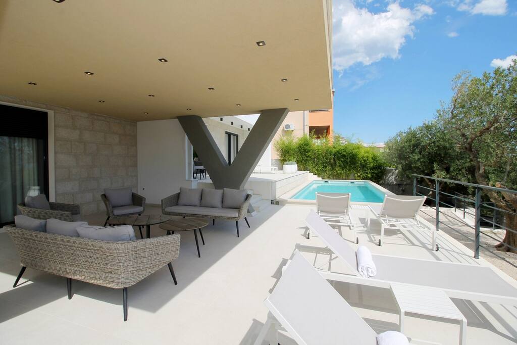 Comfortable furniture at covered area in front of the Bedroom no1