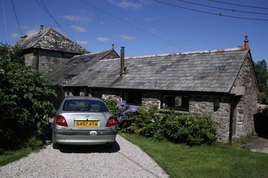 Parking spot and the back of the Piggery
