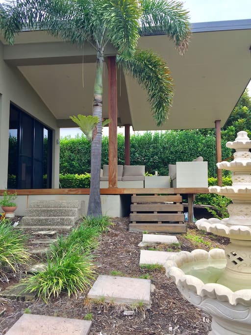 Beautiful outdoor undercover deck that overlooks our green landscaped garden