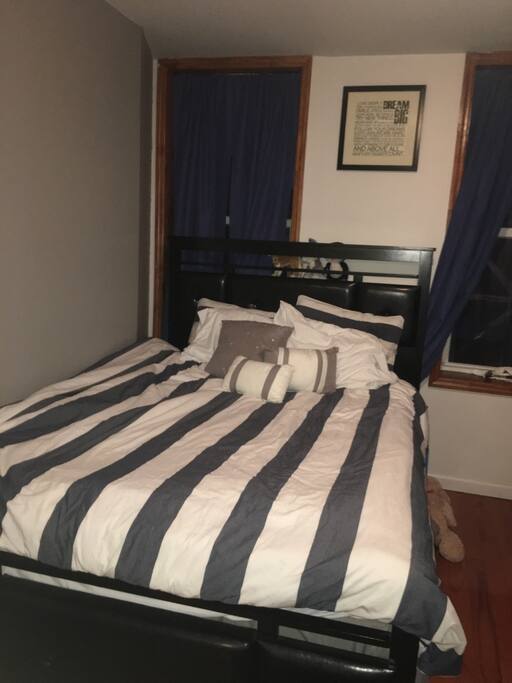 Queen size bed with plenty of pillows!