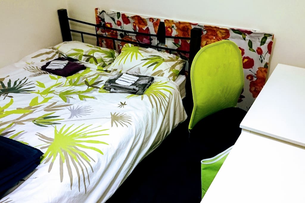 Queen size bed in the guest room