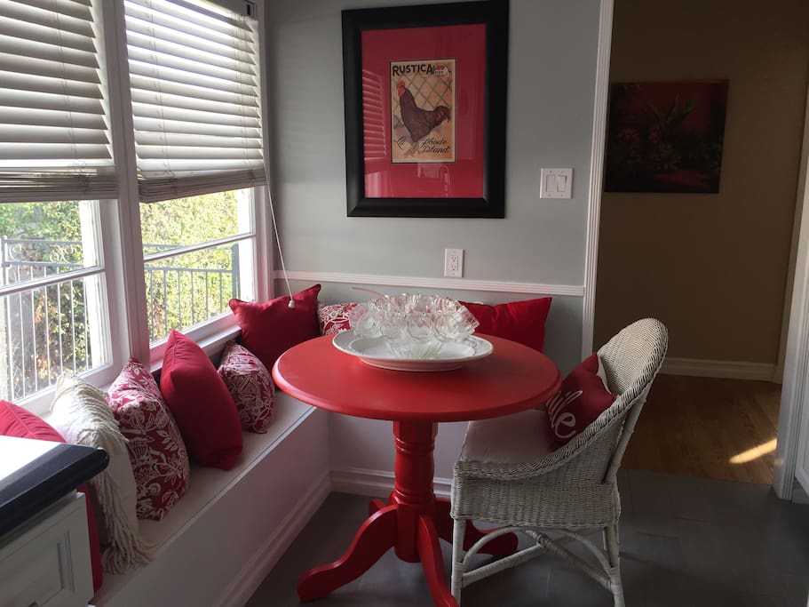 Kitchen has breakfast nook with banquets