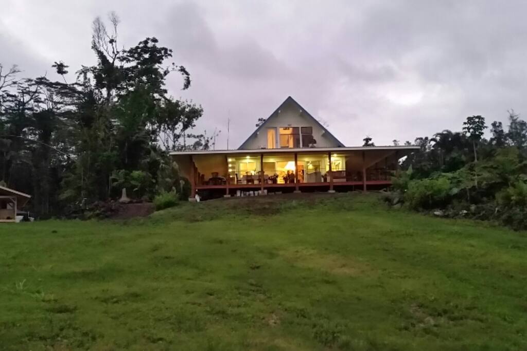 The Galapagos House is a plantation style home with a full wraparound lanai with dinning and ocean view seating areas.