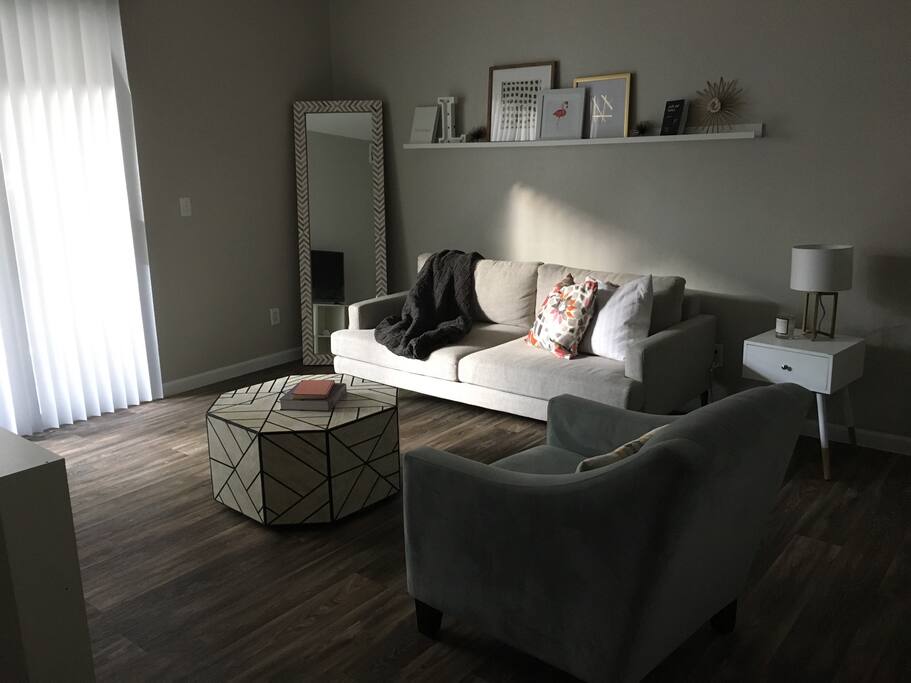The living room, please make yourself at home. Shoes off the couch please :)