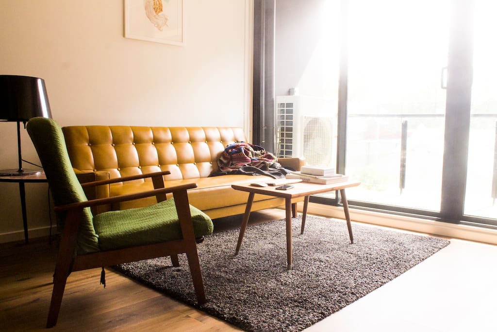 Lounge Room - fold out leather 3-seat sofa, fully reclinable danish armchair.