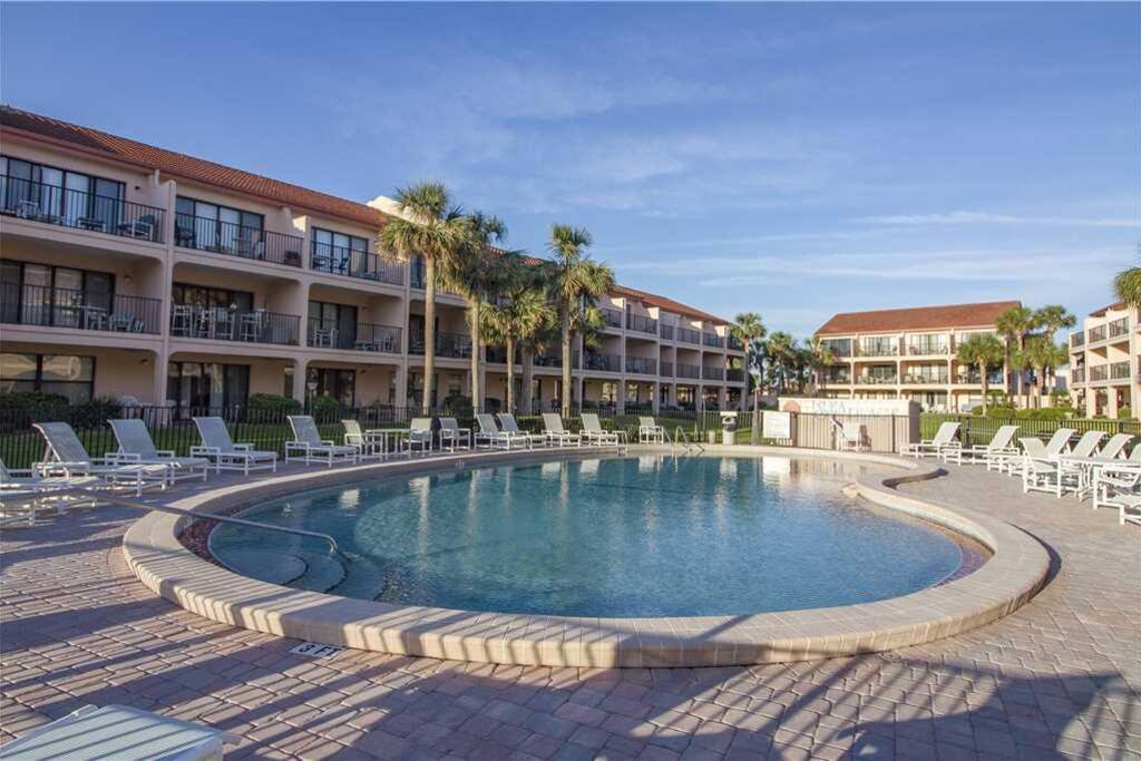 Take a deep breath and enjoy the blue, alluring pool! - Dive into Sea Place's beautiful complex pool or lounge on chair nearby, s