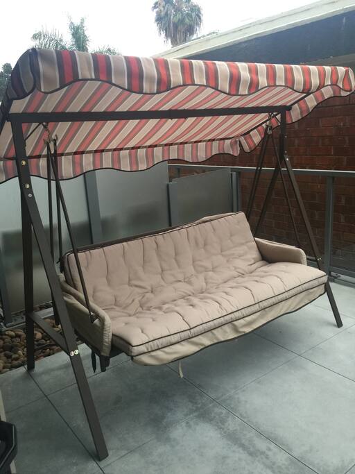 Private pattio and swing, lets down to a bed