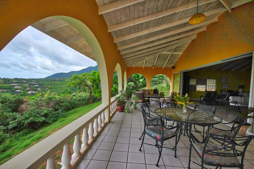 Dining and lounging under covered patio, to mountain views and ocean views.