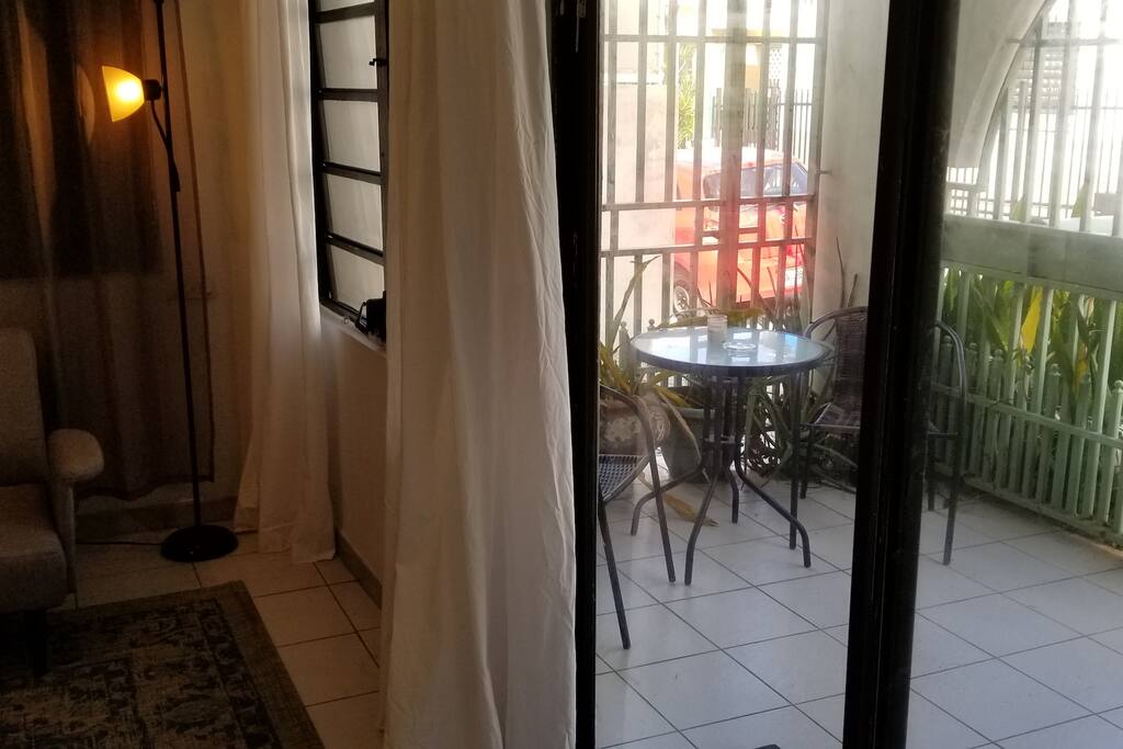 ADDITIONAL SITTING AREA IN THE BALCONY JUST OUTSIDE THE MASTER ROOM.