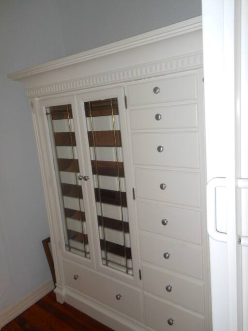 Armoire in dressing room.