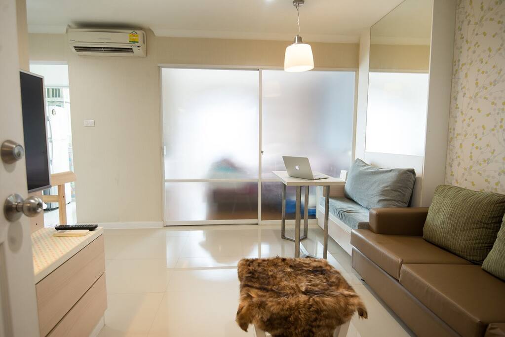 There are 2 comfortable and soft sofas with a desk for work if needed.