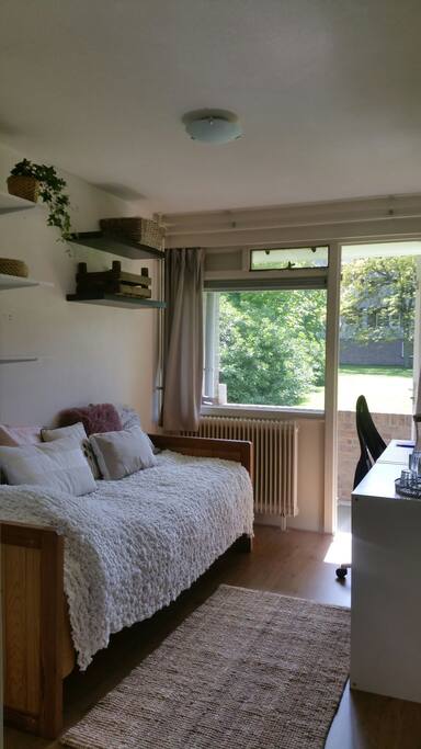 The bed is very comfortable and there is a built in closet in the room to hang your clothes.