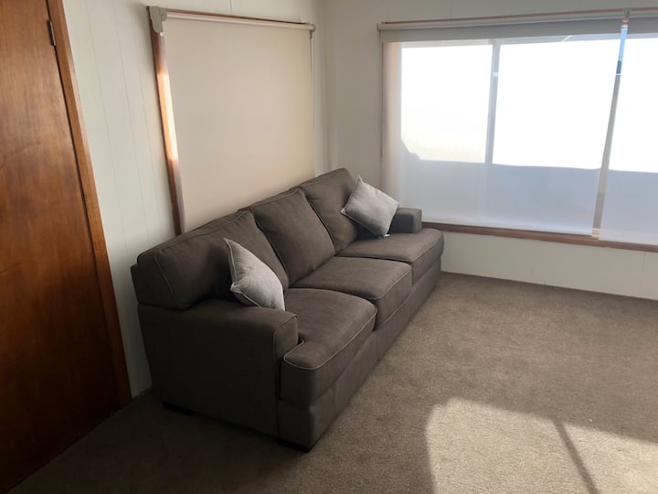 Room 4 / sun room ( queen pull out sofa) this room also has TV, board games and books 