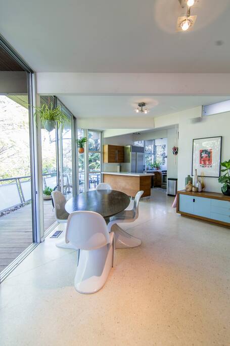 Sliding glass doors turn the entire upstairs into an indoor / outdoor space