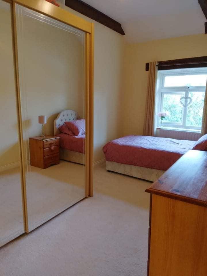 Bedroom 3.
This single bed has also been described as "super comfy" by previous guests!

There is a large mirrored wardrobe in here, which has plenty of storage & you will find spare pillows, an iron & small ironing board stored in one side.

