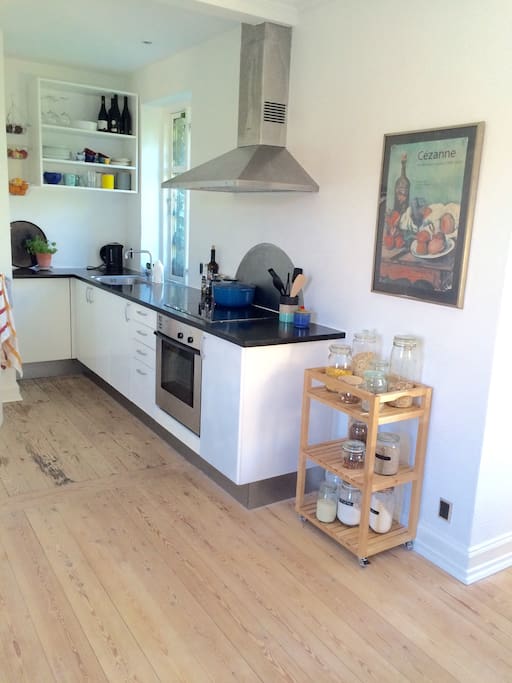 Very functional open kitchen space next to the living room.