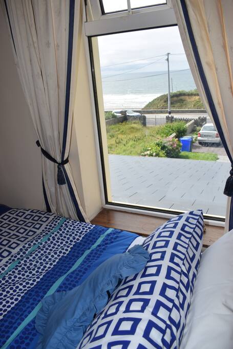 Front bedroom: Queen bed with a view of the ocean.