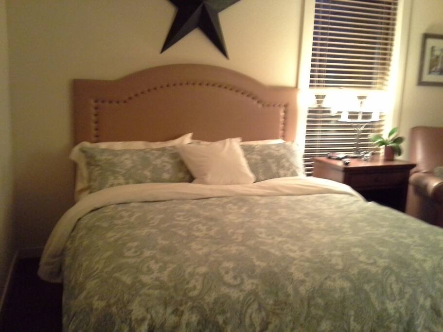 King size bed with down comforter.