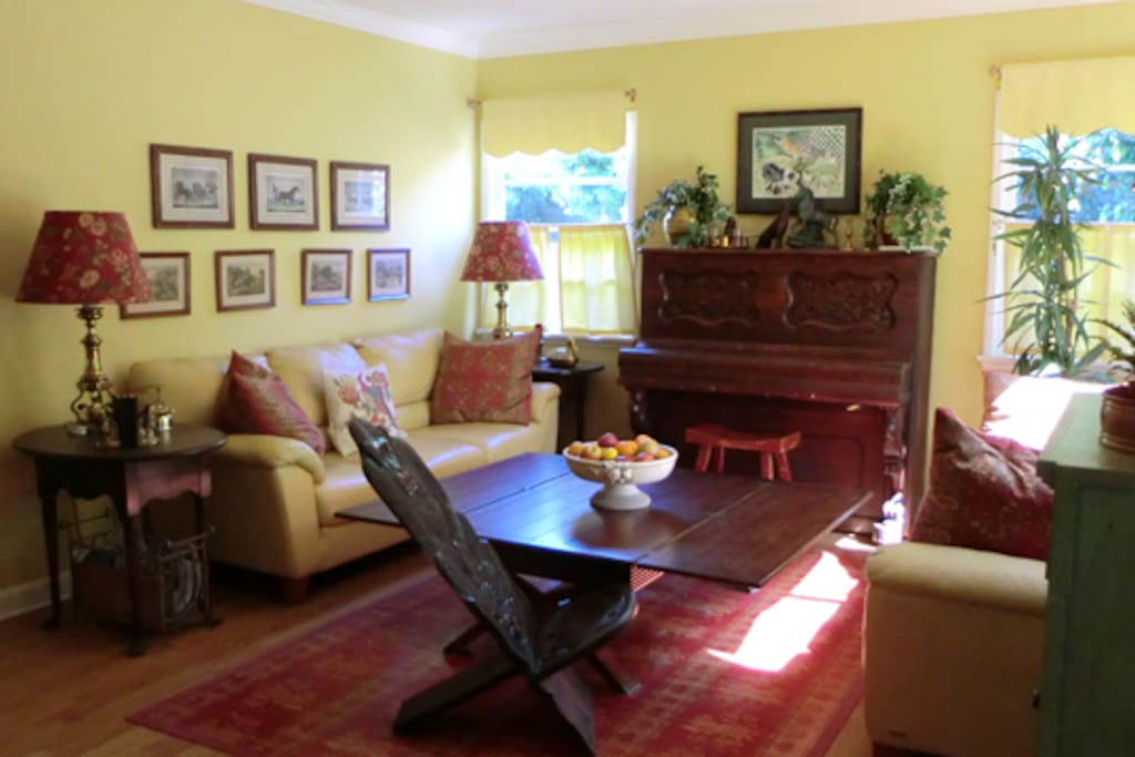 Cozy Living Area w/ Piano, 2 Large Couches and Large Coffee Table