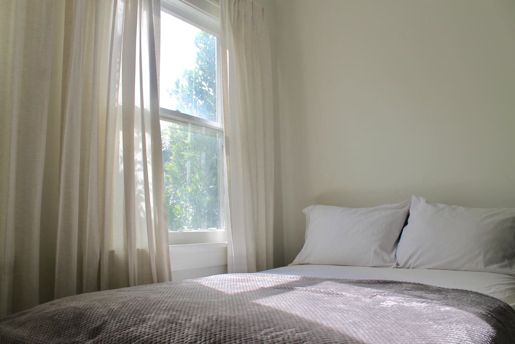 Cozy up on this comfortable bed from Original Mattress Factory- extra blankets and towels provided!