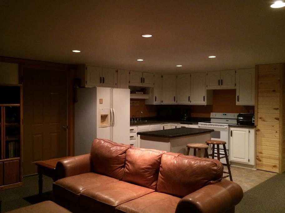 Main living room facing kitchen area