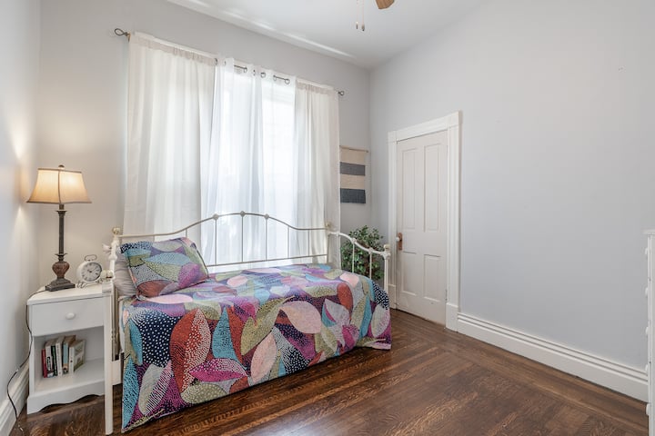 It looks like there is only one bed, but there is a twin mattress underneath that rolls out with ease! This room has two brand new twin mattresses (despite it looking like one).
