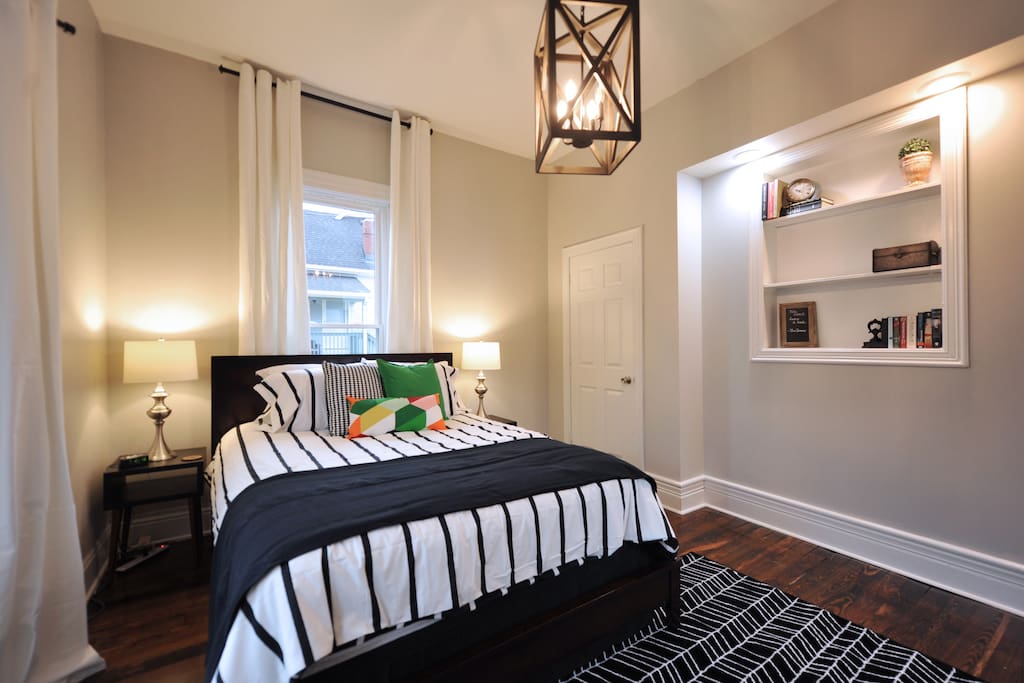Master bedroom with wonderful natural light. Comfortable queen bed and spacious closet!