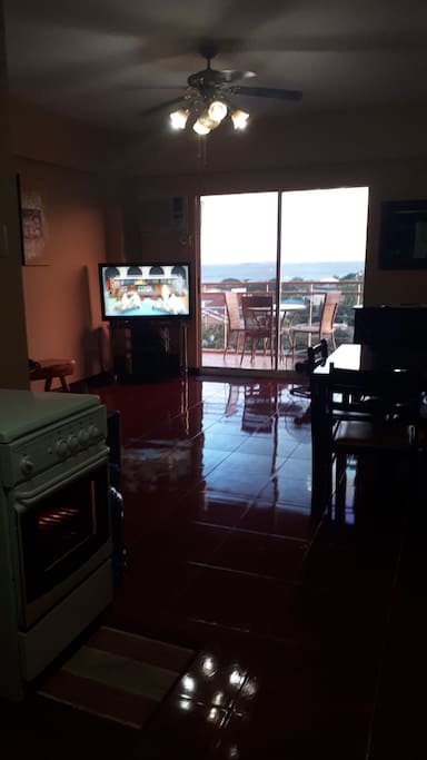 view from the kitchen towards the downstairs balcony