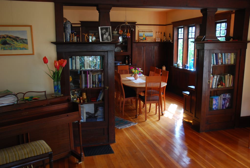 View into dining room, with piano