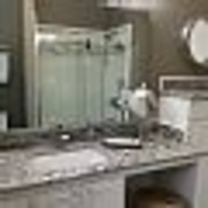 Full bath with tub and shower.