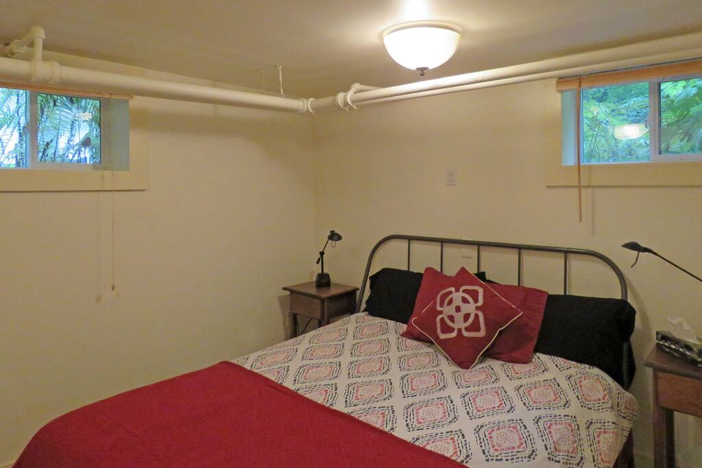 Two windows make for a bright, airy bedroom.