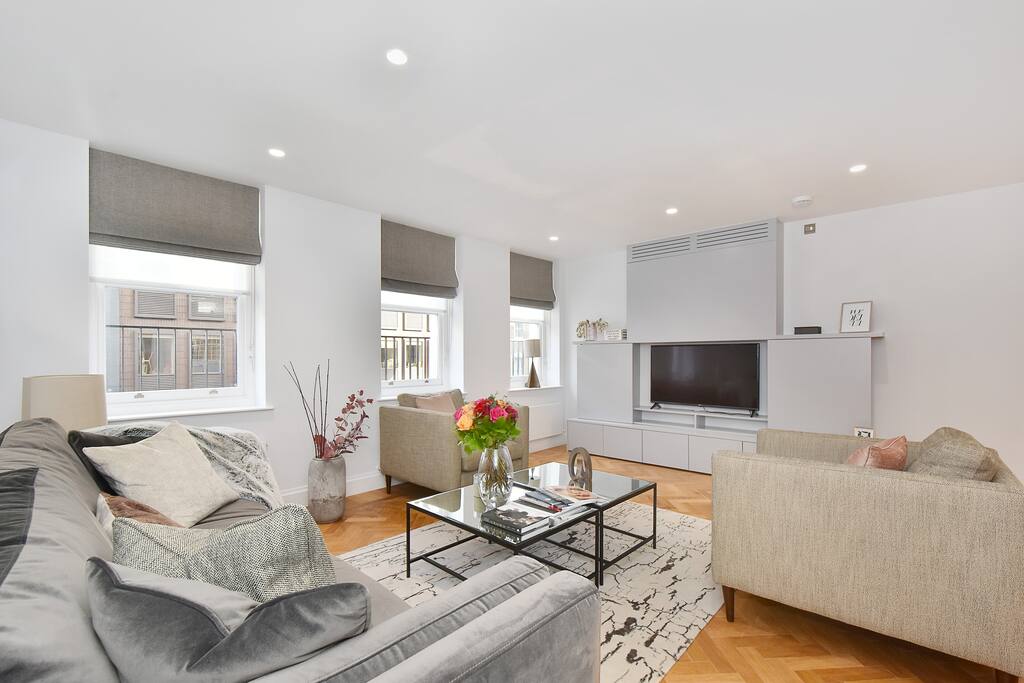 The spacious, open plan living area with Lounge, Dining Area and Kitchen