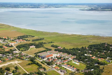 8 person holiday home on a holiday park in blåvand