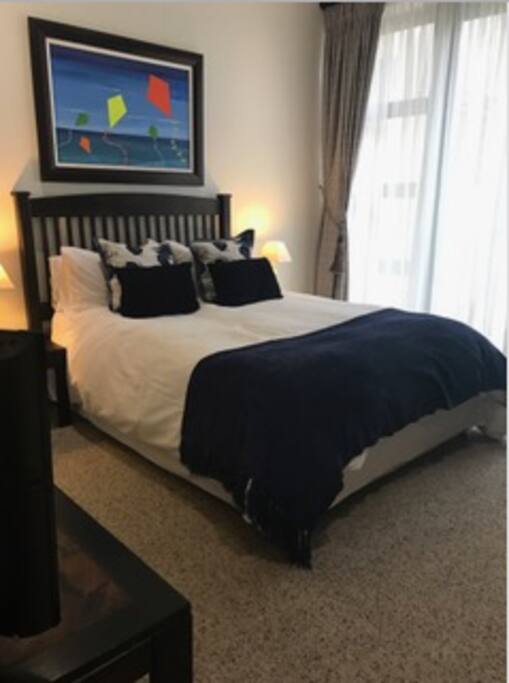 1st Spacious double room with TV, coffee station and private veranda and en-suite bathroom with bath and shower