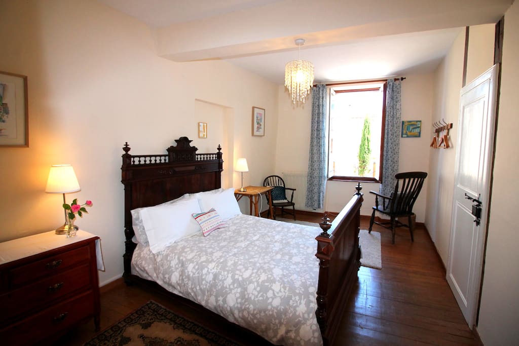Room 1, simple French country style overlooking the square