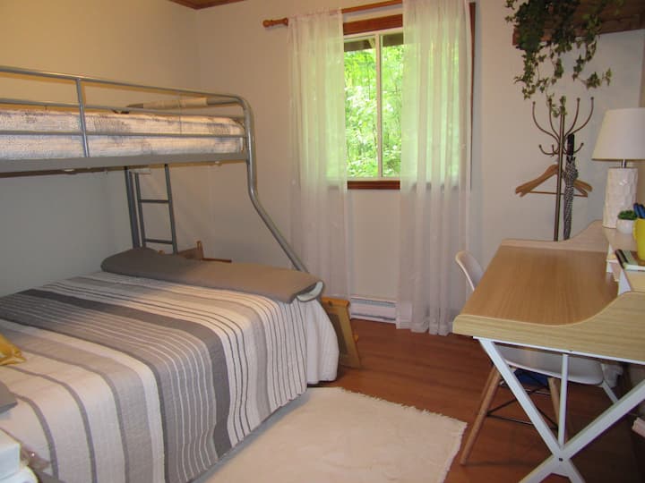 Bedroom with double bed / single bunk bed.  Desk/chair