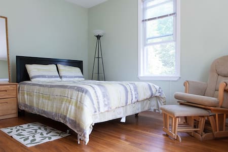 Spacious, cozy bedroom in a private home